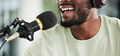 Image showing Microphone, headphones and man streaming live, closeup and media broadcast with web radio host. Happy person, influencer or content creator with mic, internet recording and networking with happiness