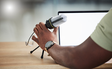 Image showing Microphone, laptop screen and mockup with hand of person for live streaming, radio and speaker. Social media, influencer and communication with closeup of man for podcast, digital and content creator