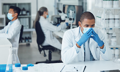 Image showing Lab, stress and scientist thinking of research in a laboratory worried to fail, mistake and problem with face mask. Error, anxiety and man with fatigue due to medical or healthcare development