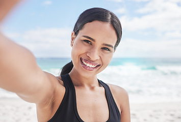 Image showing Happy woman, portrait and fitness on beach for selfie, photography or outdoor social media post. Female person smile for picture, photo or memory in workout, exercise or running on the ocean coast