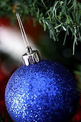 Image showing Christmas ornaments on tree.