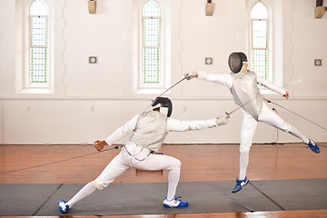 Image showing Fencing, sport and people with sword to fight in training, exercise or workout in hall. Martial arts, stab and fencers or men jump in mask and costume for fitness, competition or target in swordplay