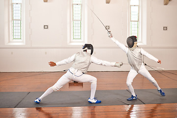 Image showing People, training and fight in fencing competition, duel or combat with martial arts fighter and athlete with a sword and weapon. Warrior, blade and team in creative fighting, exercise or fitness