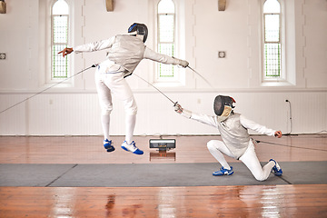 Image showing Fencing, sport and jump with sword to fight in training, exercise or workout in a hall. Martial arts, match and fencers or people with mask and costume for fitness, competition or target in swordplay