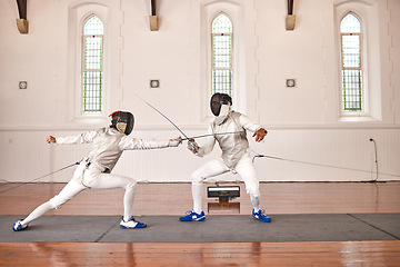 Image showing People, fighting and fencing with a sword in competition, duel or combat with martial arts fighter and athlete with a weapon. Warrior, blade and person in creative fight, exercise or fitness