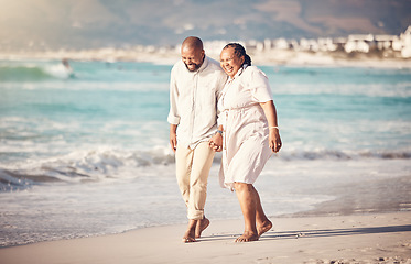 Image showing Love, hand holding and senior with black couple at beach and laugh on retirement, vacation and summer break. Travel, smile and and bonding with man and woman walking for happy, funny and relax