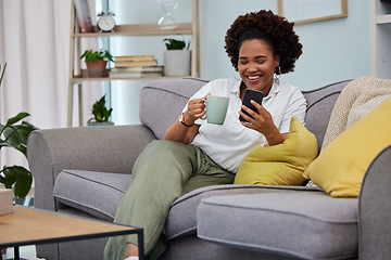 Image showing Woman, coffee and smartphone on sofa in living room, social media and reading funny memes. Happy female person relax on couch, cellphone and tea for texting, chat app and download mobile games