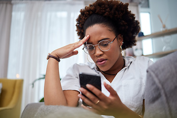 Image showing Woman, stress and reading phone in home for notification of bad news, problem and crisis of mistake on social media. Confused african female person with anxiety, doubt and frustrated with mobile scam