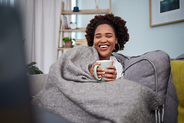 Image showing Laptop, coffee and woman with blanket on sofa laughing for comedy, funny and comic movies. Happy, home and African female person relax with computer for entertainment, streaming and watching film