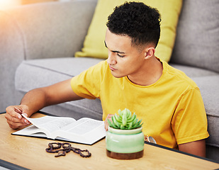 Image showing Prayer, reading and bible with man in living room for worship, spiritual and Christian faith. Hope, God and belief with person praying with holy book at home for religion, thinking and gratitude