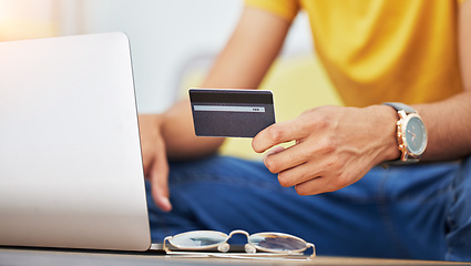 Image showing Credit card, hand and laptop for online shopping, sale and payment with technology at home. Web banking, ecommerce and website promotion with person buying on computer for deal purchase on app