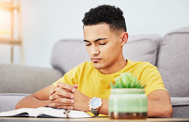 Image showing Prayer, peace and bible with man in living room for worship, spiritual and Christian faith. Hope, God and belief with person praying with holy book at home for religion, thinking and gratitude