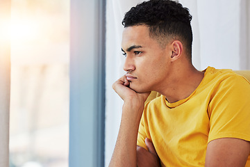 Image showing Thinking, man and home with stress and sad in living room feeling bored and frustrated. Moody, grief and mental health of a male person on a couch with anxiety and tired from concerns of fail