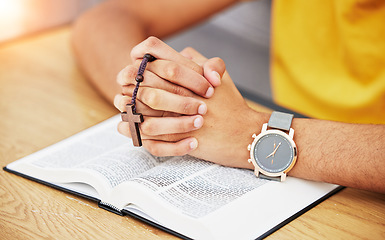 Image showing Prayer, worship and bible with hands of person in living room for peace, spiritual and Christian. Hope, God and belief with closeup of man with holy book at home for religion, praying and gratitude