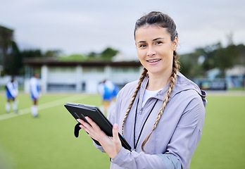 Image showing Tablet, sports and coaching with portrait of woman on field for hockey, fitness and training. Checklist, review and planning with female trainer at stadium for workout, challenge and digital analysis