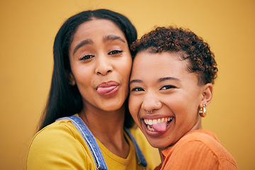 Image showing Selfie with tongue, fashion and portrait of women on yellow background by wall with trendy clothes, smile and style. Happy, summer clothes and face of female people on holiday, vacation and weekend