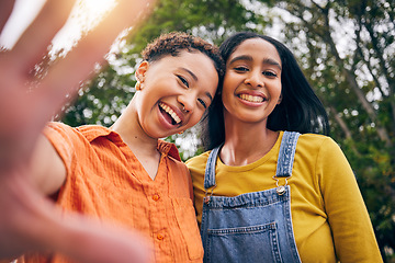 Image showing Selfie, happy and portrait of women in park for social media, online post and profile picture. Friendship, nature and female people with hand take photo for bonding, holiday and relaxing outdoors