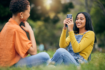 Image showing Phone, photography and women at a park relax, bond and having fun on the weekend together. Profile picture, smartphone and female friends in forest with photo, memory and social media post in nature