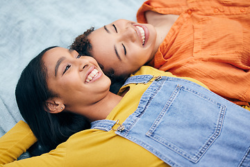 Image showing Lesbian, couple and women in a park happy with freedom, care and bonding on picnic outdoor. Gay, love and face of queer female partners on a blanket in a forest smile, talking and enjoying weekend