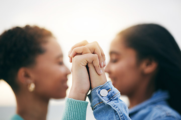 Image showing Holding hands, lgbtq and queer couple with love, outdoor and romance with support, marriage and quality time. Lesbian, fingers and women with holiday, romantic and loving together with equality