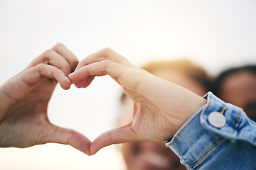 Image showing Closeup, support and couple with heart hands, outdoor and relationship with growth, health and icon. Zoom, people and lovers with symbol for romance, care and happiness with gesture and solidarity