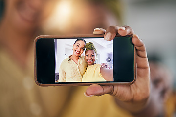 Image showing Lesbian couple, women and selfie with phone screen in home in portrait, post and web blog in living room. African girl, photography and memory with profile picture, lgbtq or social media app in house