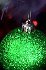 Image showing Christmas ornaments on tree.