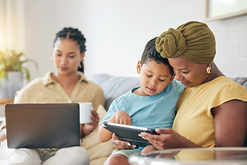 Image showing Technology, tablet and family child, mom or black woman reading online ebook, e learning and remote education. Studying, lesbian mothers or relax gay people teaching kid on home living room couch