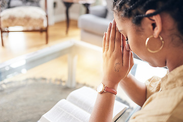 Image showing Worship, bible and woman in living room praying, thank you and praise, mercy and blessing at home. Hands, pray and Christian lady in prayer to God, humble or scripture, guide or forgiveness in house