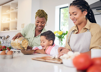 Image showing Breakfast, child and gay family in home kitchen cooking for learning, development and love. Adoption, lesbian or lgbtq women or parents and a happy young kid together for cereal or food with help