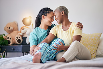 Image showing LGBT, bedroom or couple bond, happiness and smile for home love, support and enjoy quality time together. Forehead, trust or happy gay people, bisexual partner or lesbian women relax on apartment bed