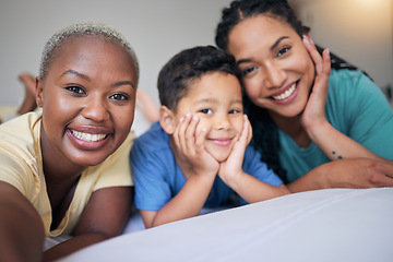 Image showing Selfie, gay family and happy on a bed in home bedroom for security, quality time and love. Adoption, lesbian or LGBTQ women or interracial parents and happy kid together for social media memory