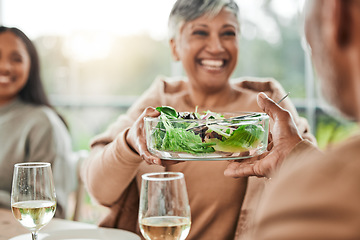 Image showing Senior woman, salad and family dinner at thanksgiving celebration at home. Food, elderly female person and eating at a table with a smile from hosting, lunch and social gathering on holiday in house