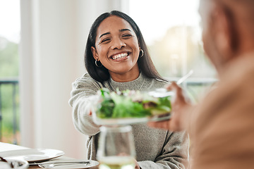 Image showing Happy woman, salad and family dinner at thanksgiving celebration at home. Food, female person and eating at a table with a smile from hosting, lunch and social gathering on holiday in dining room