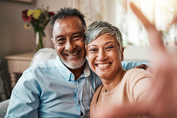 Image showing Senior couple, selfie and happy on home sofa with a smile, happiness and love. Mature man and woman relax together on a couch for profile picture, social media and commitment or memory of marriage