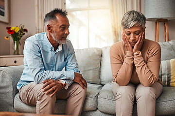 Image showing Angry, senior couple and fight on couch, conflict and depression with a breakup, cheating or stress. Divorce, old woman or elderly man with mental health, home or separation with crisis or retirement