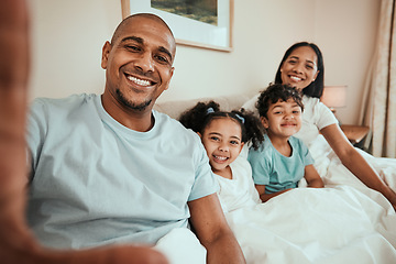 Image showing Relax, selfie and happy family in bed together for social media, profile picture or relax with mom and dad in morning waking up. Parents, kids and smile on face in bedroom for quality time on holiday