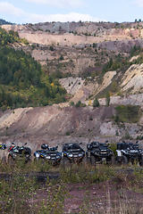 Image showing Various ATV quad motors in the forest area ready for adventurous driving