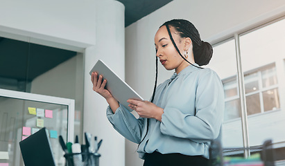 Image showing Tablet, reading and business woman at web analyst company with typing. Technology, female person and online professional working in a office with computer and digital data research for project