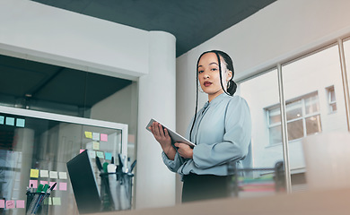 Image showing Low angle portrait of woman in office on tablet, research and sticky note ideas on moodboard for business plan. Internet, confidence and businesswoman on digital app for online review at startup.