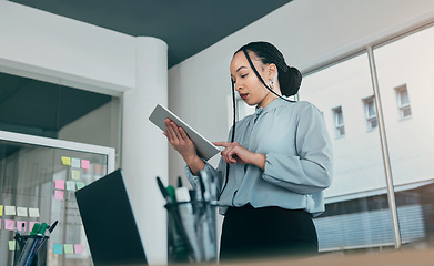 Image showing Tablet, planning and business woman at web analyst company with typing. Technology, female person and online professional working in a office with computer and digital data research for project