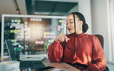 Image showing Woman in office with laptop, research and reading email, ideas on website for business plan and brainstorming. Thinking, internet and businesswoman on computer for online review feedback at startup.