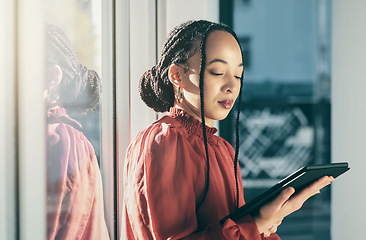 Image showing Tablet, internet and a business black woman in her office, working online for schedule or calendar planning. Technology, window and research with a corporate employee reading data or information