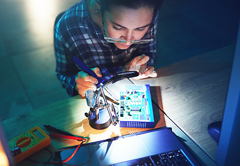 Image showing Woman, technician and motherboard with microchip, electronics or soldering iron in top view at laboratory. Information technology, circuit board or programming for future, hardware and system upgrade