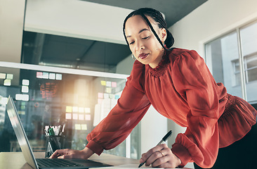 Image showing Woman with laptop research, writing ideas in book and website for business planning, brainstorming or proposal process. Thinking, businesswoman with notebook and pen on computer at startup office.