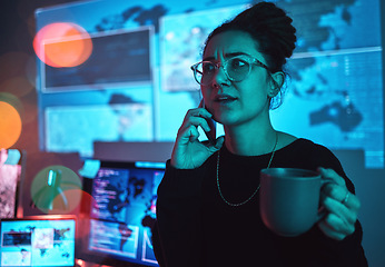 Image showing Night, coffee and a woman hacker on a phone call during a cyber security emergency in her office. Communication, software and dark with a programmer talking about an information technology problem