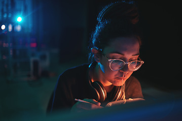 Image showing Cyber security woman, night and eating food, noodles or pasta after coding software, online surveillance or research. Hungry programmer, dark room and face of female hacker with spaghetti dinner meal