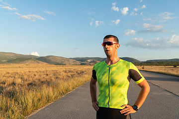 Image showing Triathlete resting after exhausting training for the upcoming marathon.