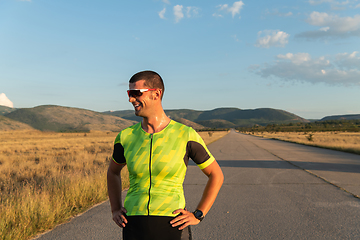 Image showing Triathlete resting after exhausting training for the upcoming marathon.