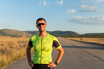 Image showing Triathlete resting after exhausting training for the upcoming marathon.